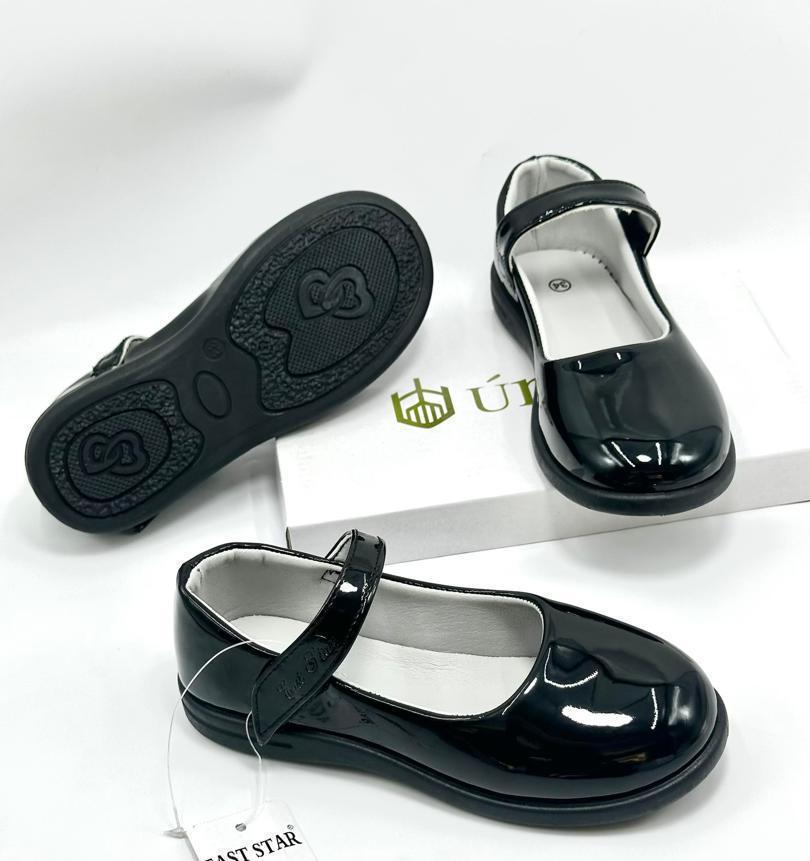 Kids black loafers